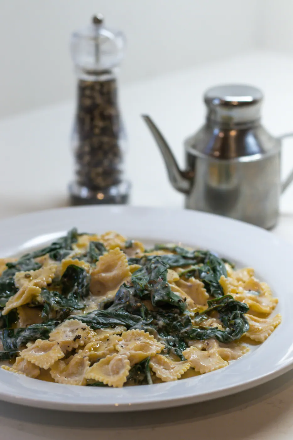 A fork lifting a bite of the pasta